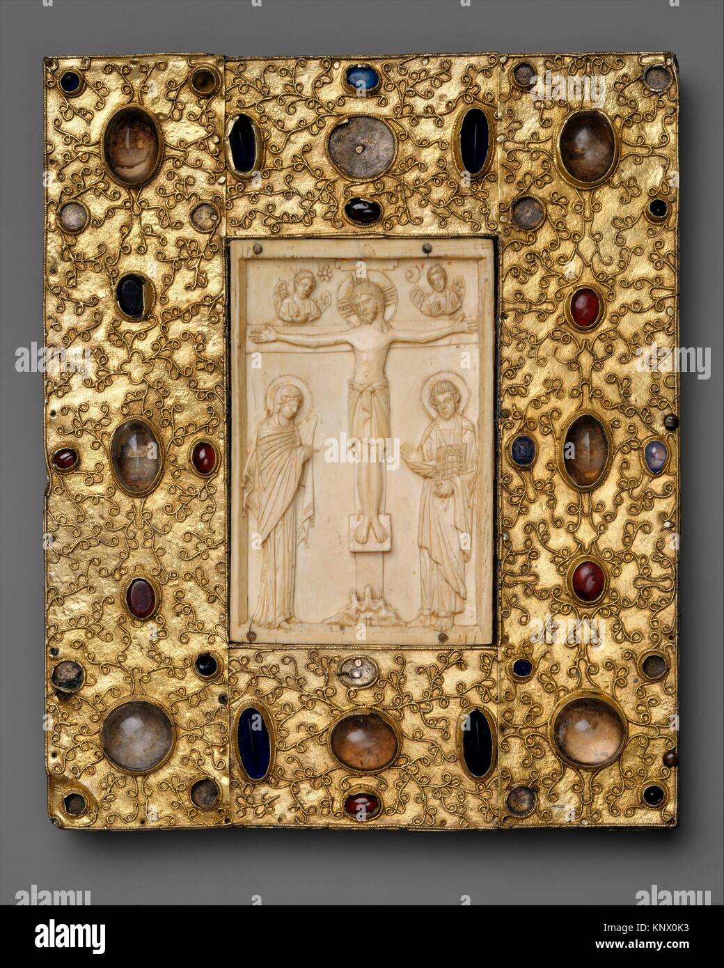 Book Cover with Byzantine Icon of the Crucifixion. Date: 1000 (ivory); before 1085 (setting); Geography: Made in Constantinople (Ivory); Made in Stock Photo