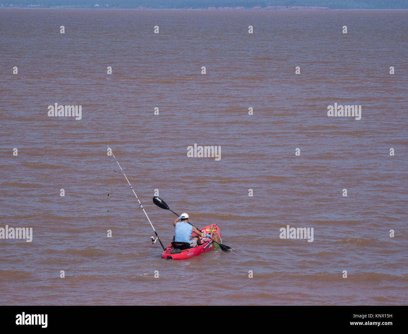 Man fishing from a kayak, Bay of Bay of Fundy, Anthony Provincial Park