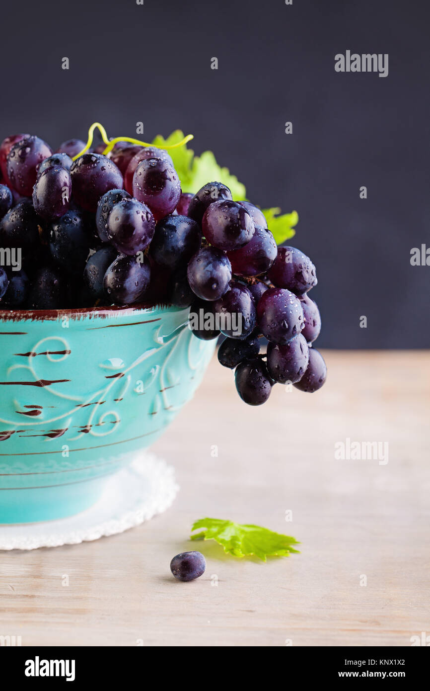 Grape with Green Leaves on Vintage Background Stock Photo - Alamy