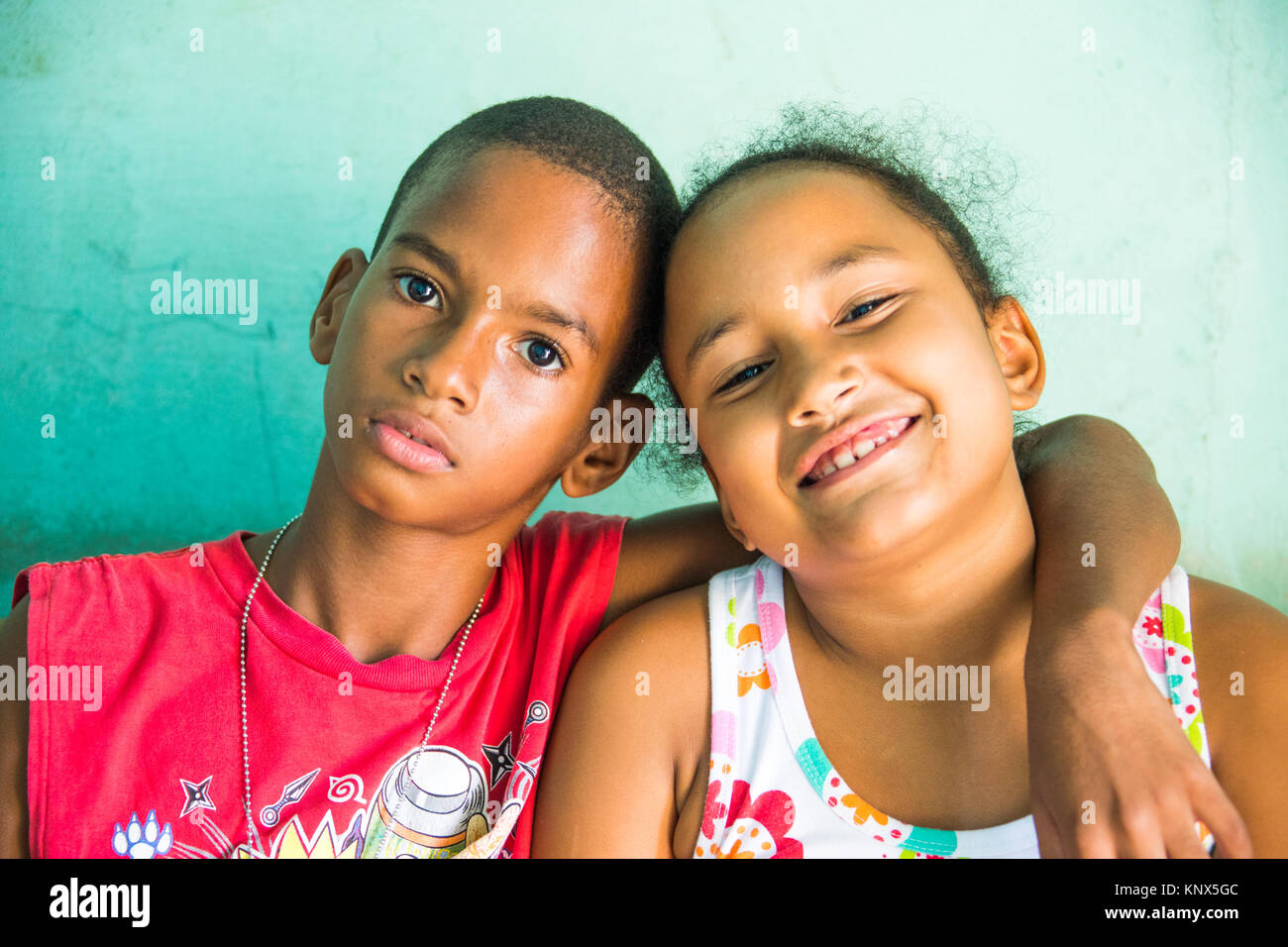 Brother and sister in their home in Cienfuegos, Cuba Stock Photo