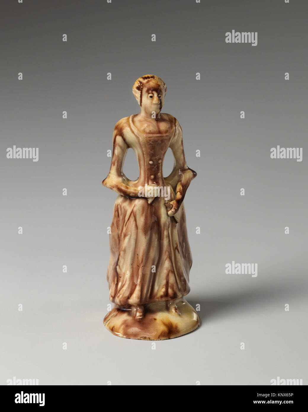 Standing woman. Maker: Style of Whieldon type; Date: ca. 1750; Culture: British, Staffordshire; Medium: Lead-glazed earthenware; Dimensions: Height: Stock Photo
