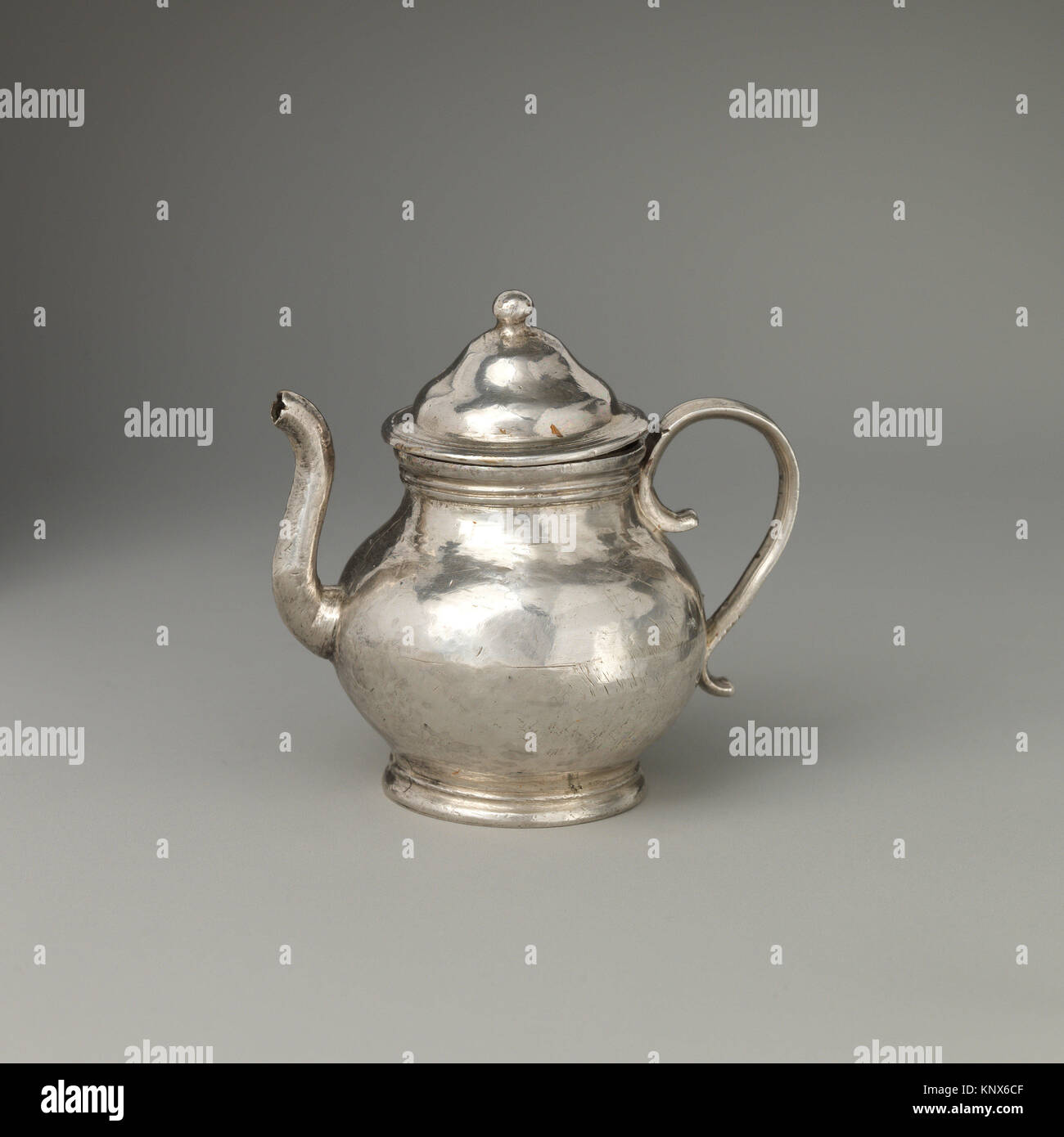 Miniature teapot with cover (part of a set). Maker David Clayton