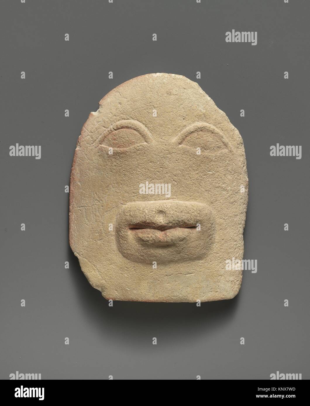 Limestone votive relief of eyes and a mouth. Period Late Classical