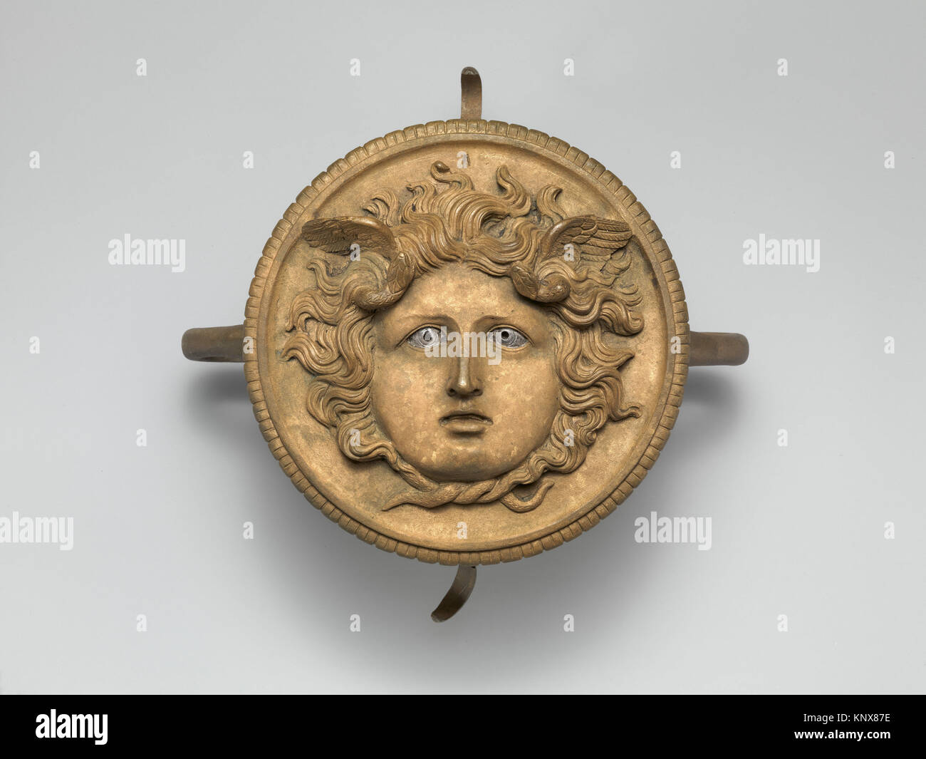 Bronze ornament from a chariot pole. Period: Imperial; Date: 1st-2nd century A.D; Culture: Roman; Medium: Bronze, silver, copper; Dimensions: H. 7 Stock Photo