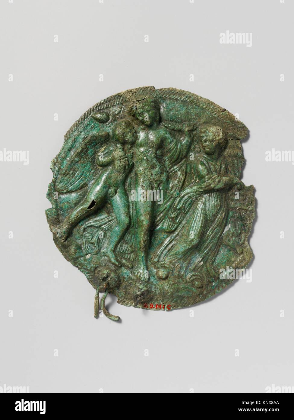 Mirror fragment. Medium: Bronze; Dimensions: Height (.c w/ handle): 6 5/8 in. (16.8 cm); Classification: Bronzes Stock Photo