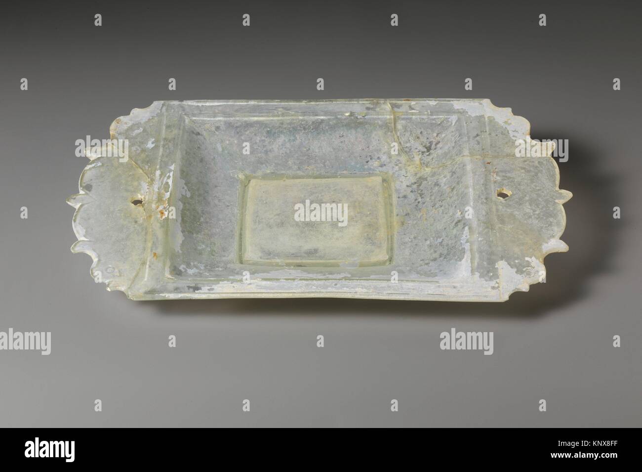 Glass serving dish. Period: Early Imperial; Date: Second half of the 1st-2nd century A.D; Culture: Roman; Medium: Glass, greenish colorless; cast and Stock Photo