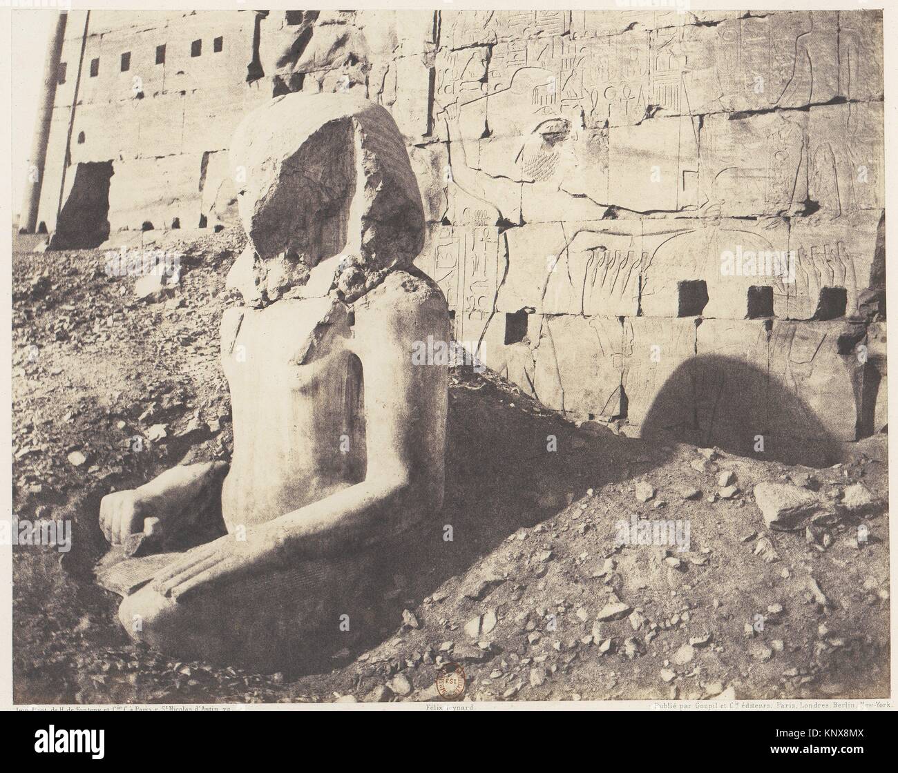 Karnak (Thèbes), Troisième Pylône - Colosse de Spath Calcaire, en D. Artist: Félix Teynard (French, 1817-1892); Printer: Imprimerie Photographique de Stock Photo