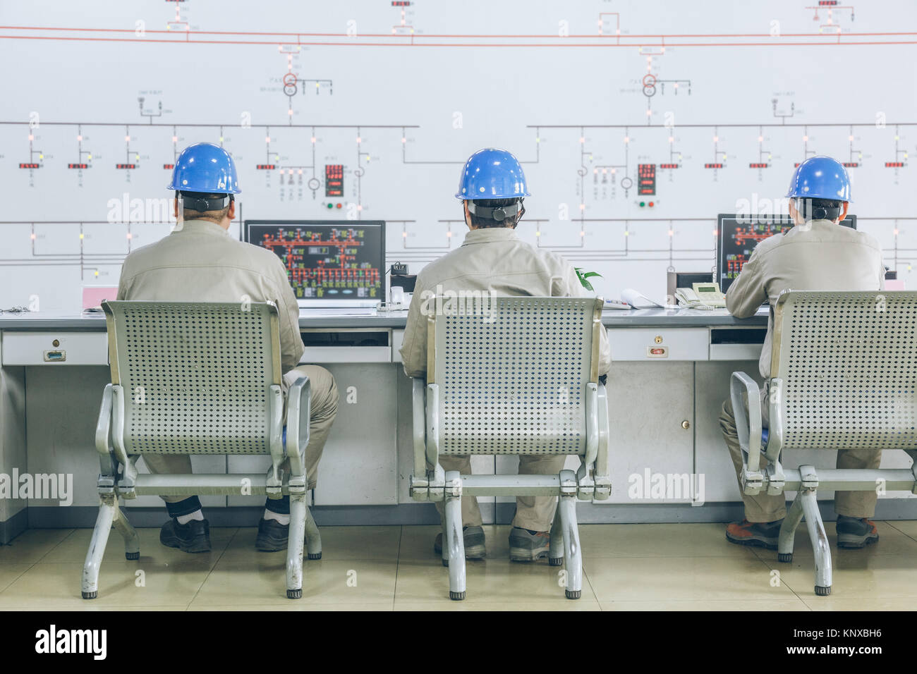 workers in control room of a factory Stock Photo - Alamy