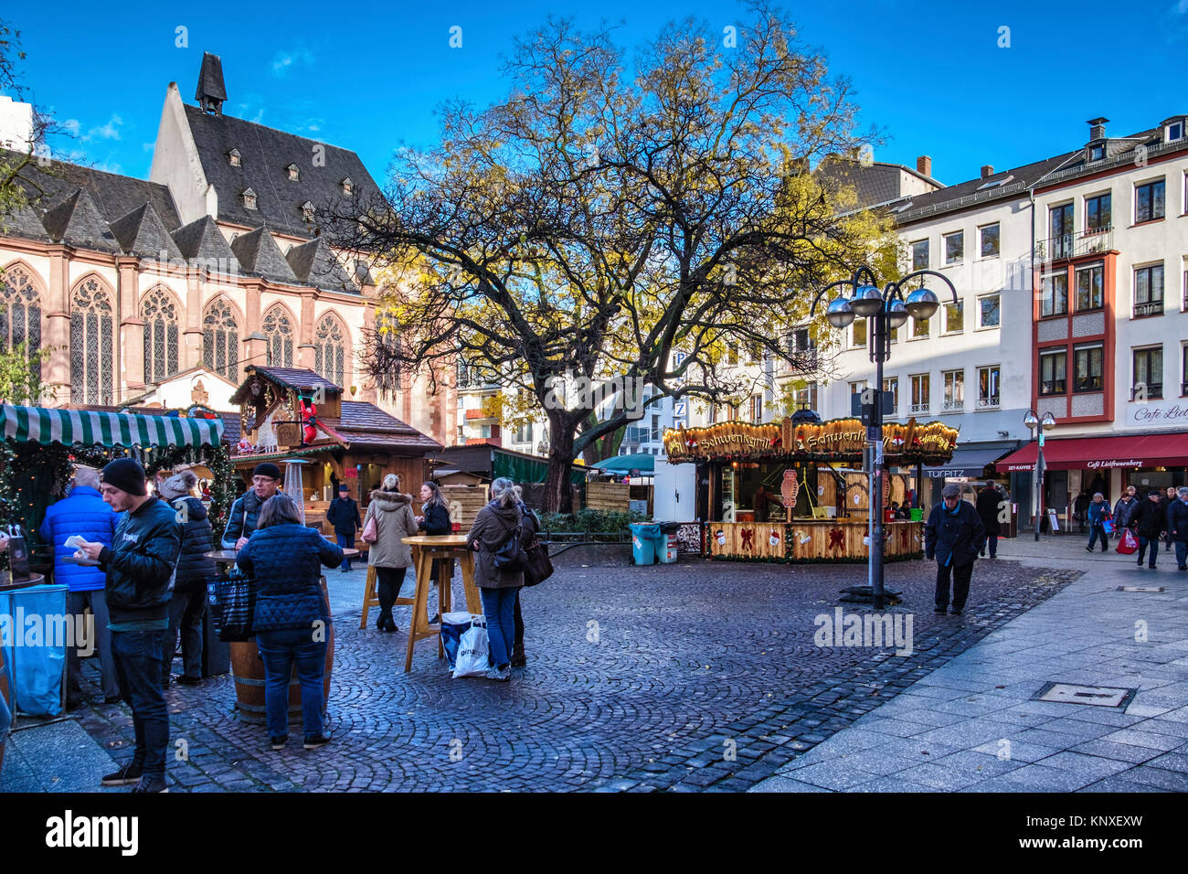 Frankfurt,Germany.Liebfrauenkirche,Our Dear Lady Gothic-style Catholic church and traditional German Christmas market stalls on historic square. Stock Photo