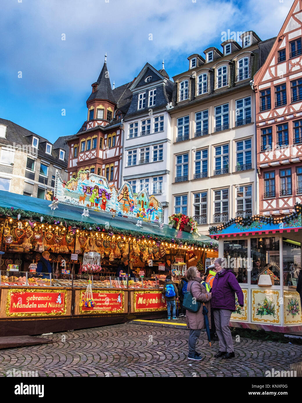 Frankfurt,Germany. Traditional German Market stalls on Römerberg with historic half-timber terraced houses, Stock Photo
