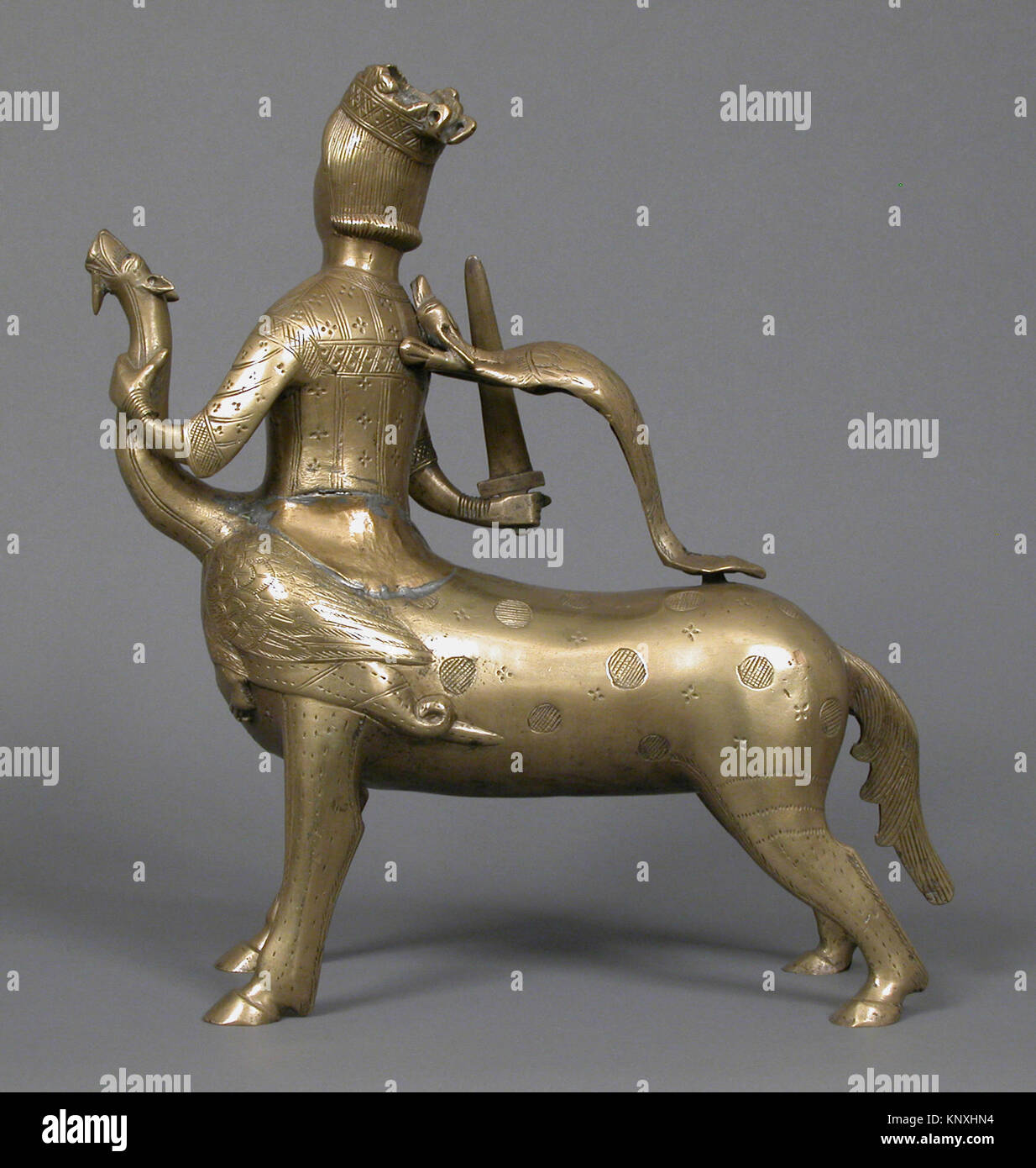 Aquamanile in the Form of a Crowned Centaur Fighting a Dragon MET sf10-37-2s3 463419 Stock Photo