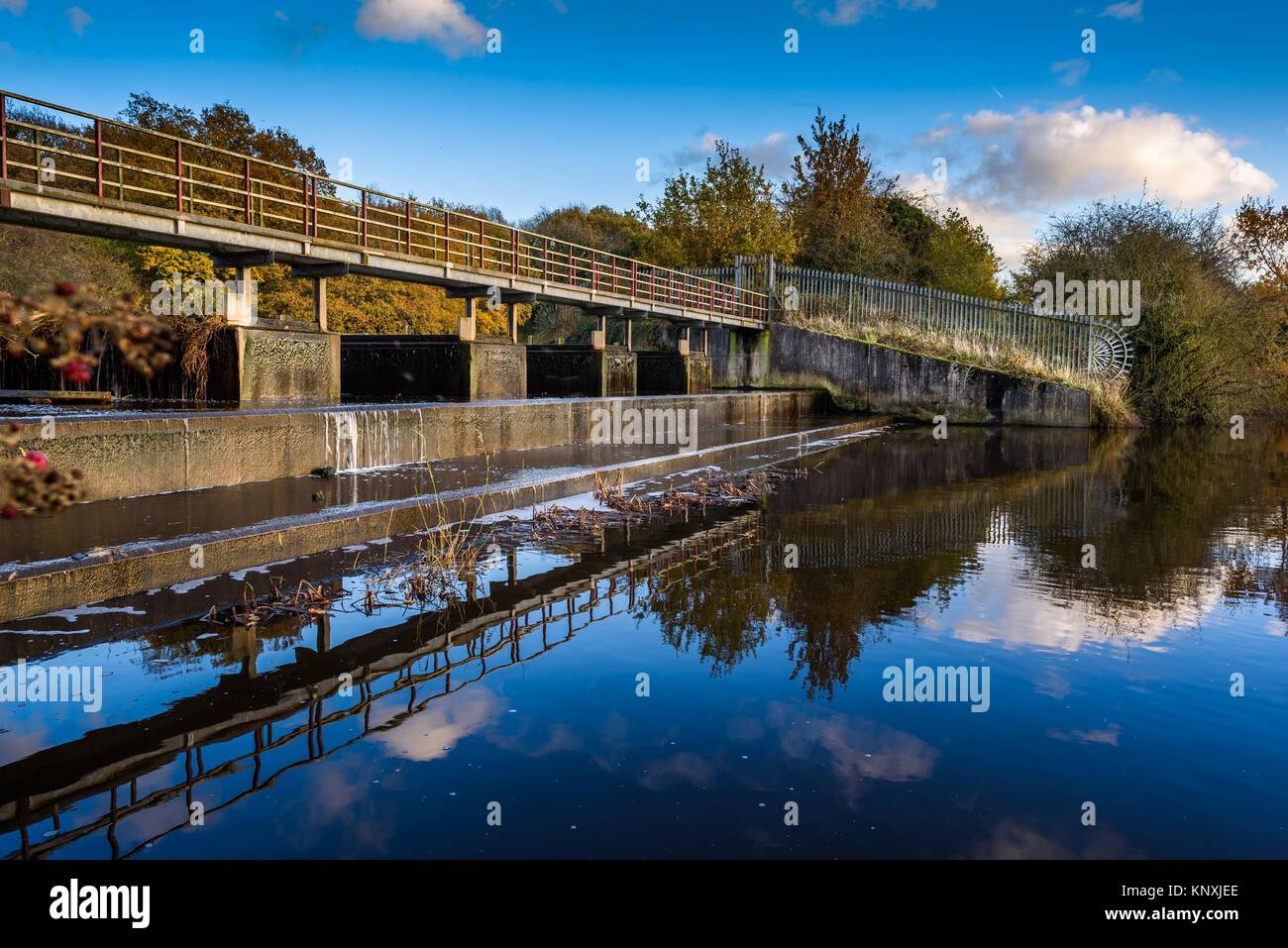 Modern weir structure on the river Weaver, Cheshire. Stock Photo