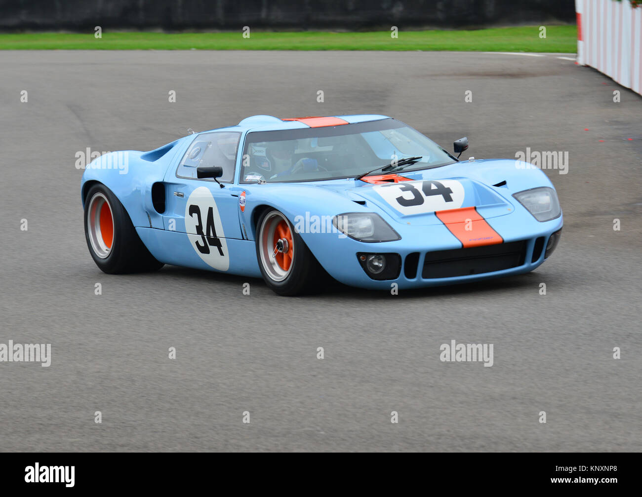 This Gulf livery GT40 was part of the demonstration run rather than the race. Goodwood Revival 2013, Whitsun Trophy race for GT40's Stock Photo
