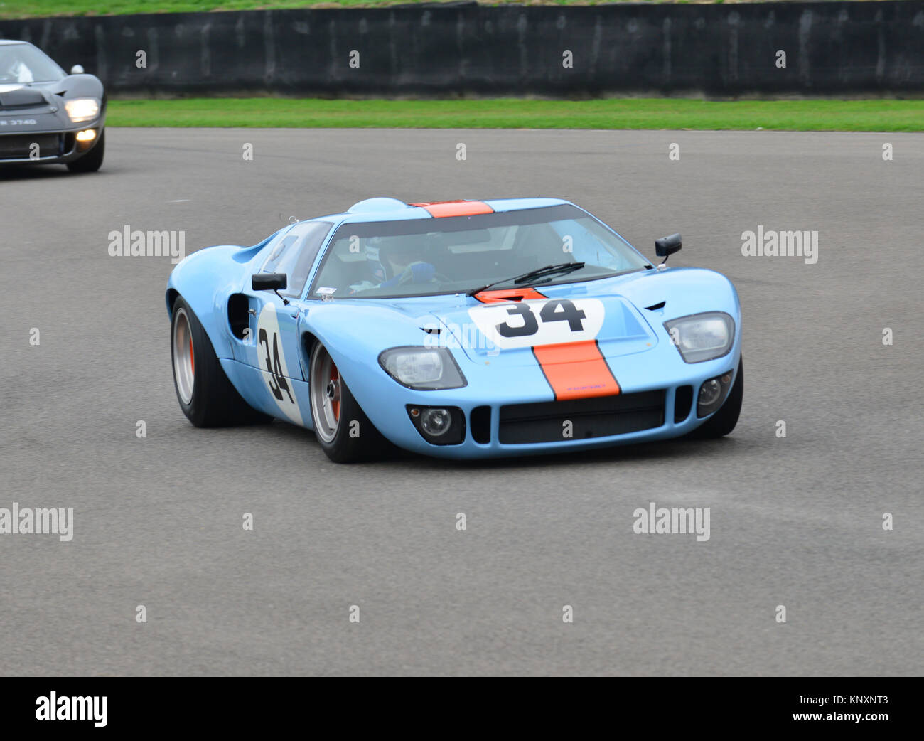 This Gulf livery GT40 was part of the demonstration run rather than the race. Goodwood Revival 2013, Whitsun Trophy race for GT40's Stock Photo