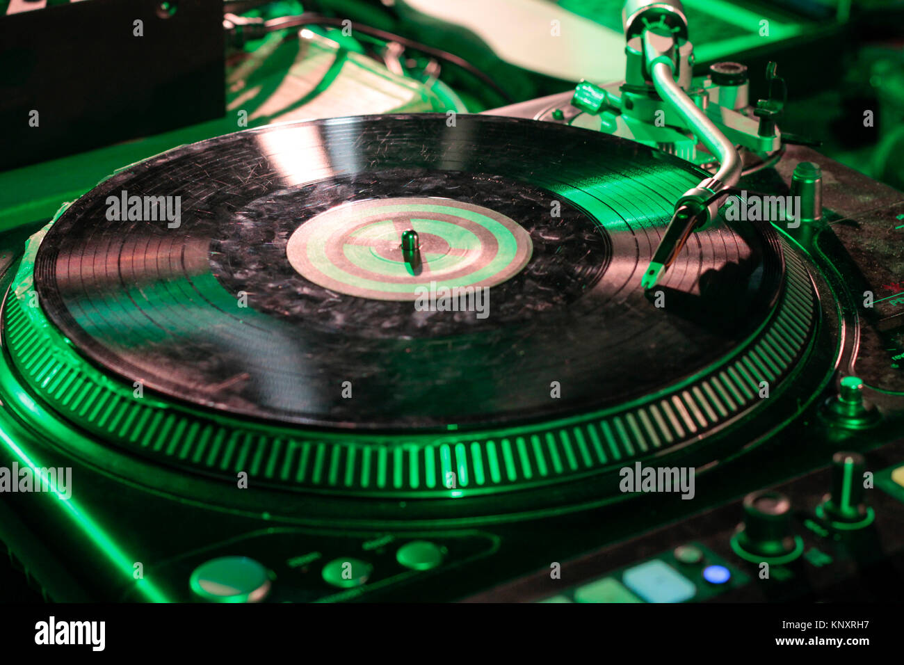 The dj uses vinyl records to mix electronic music and beat rap sound Stock  Photo - Alamy