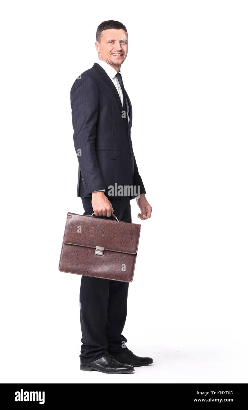 confident businessman with briefcase. side view Stock Photo