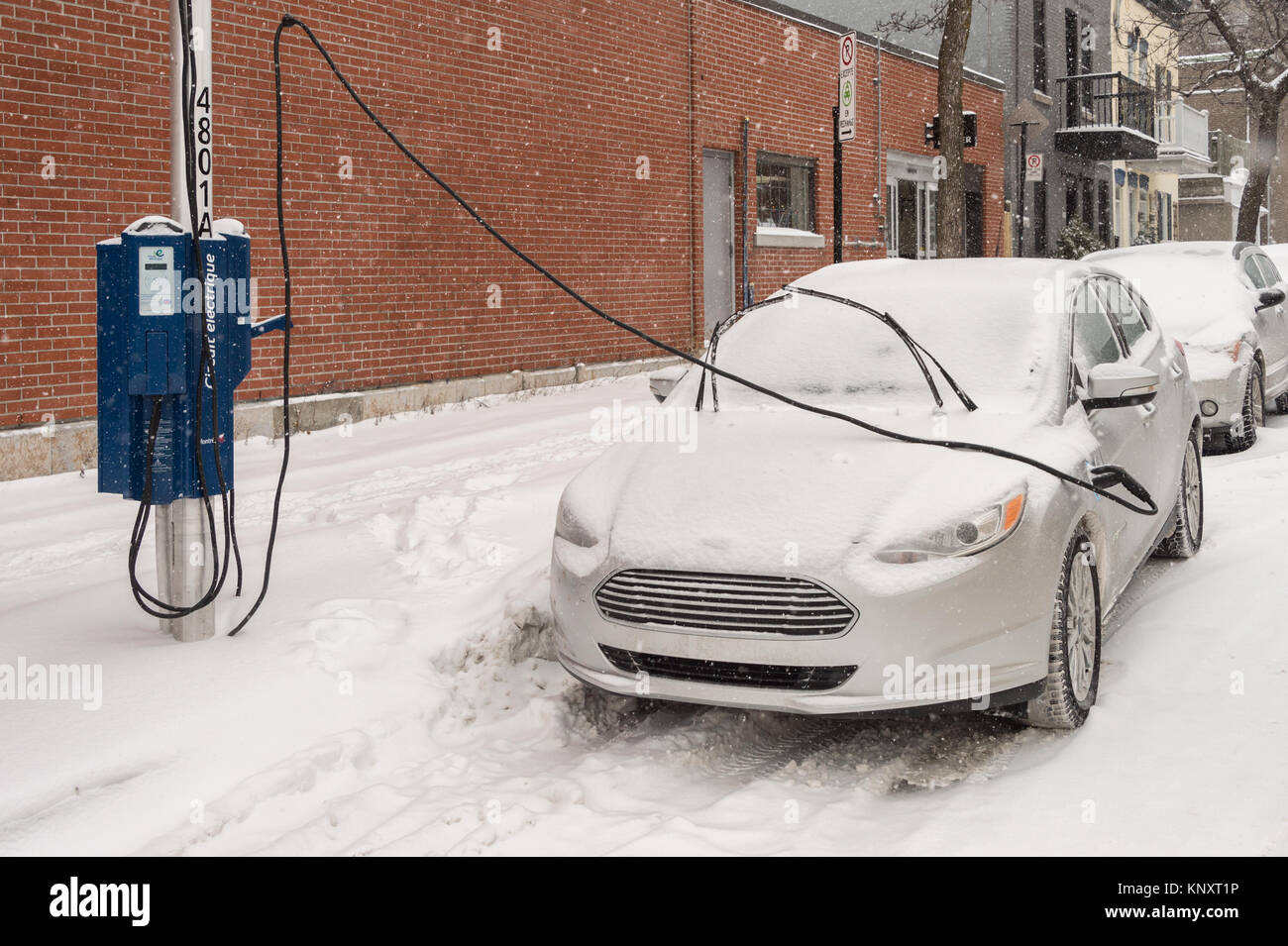 Montreal, Canada 12 December 2017 Electric car getting charged in