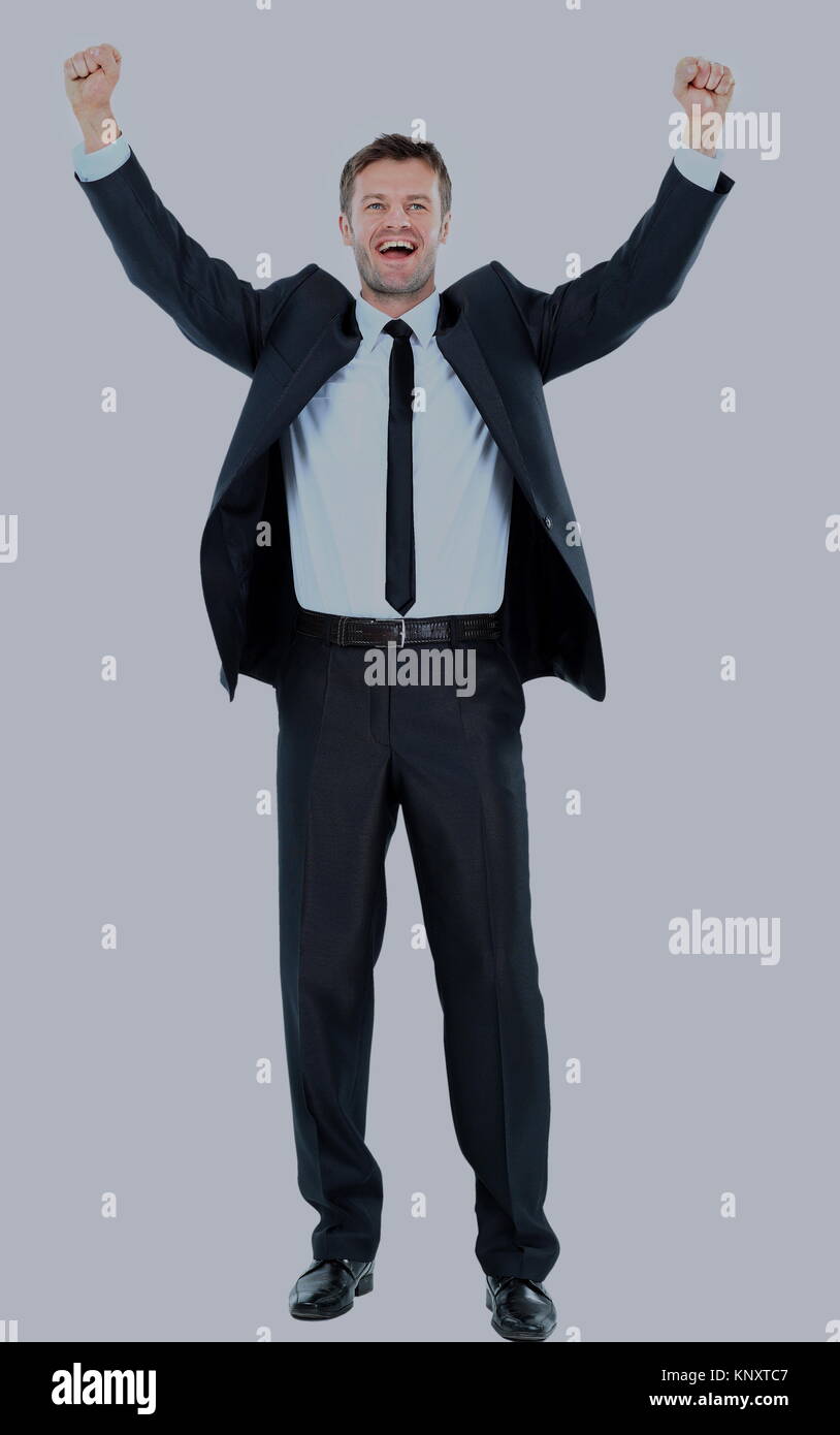 Excited handsome business man with arms raised in success - Isol Stock ...