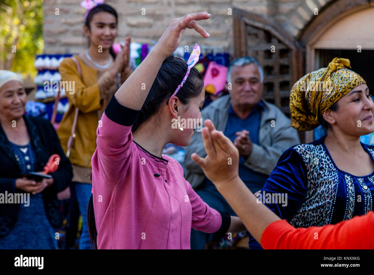 Uzbek Women Dancing In The Street, Khiva, Uzbekistan Stock Photo Alamy