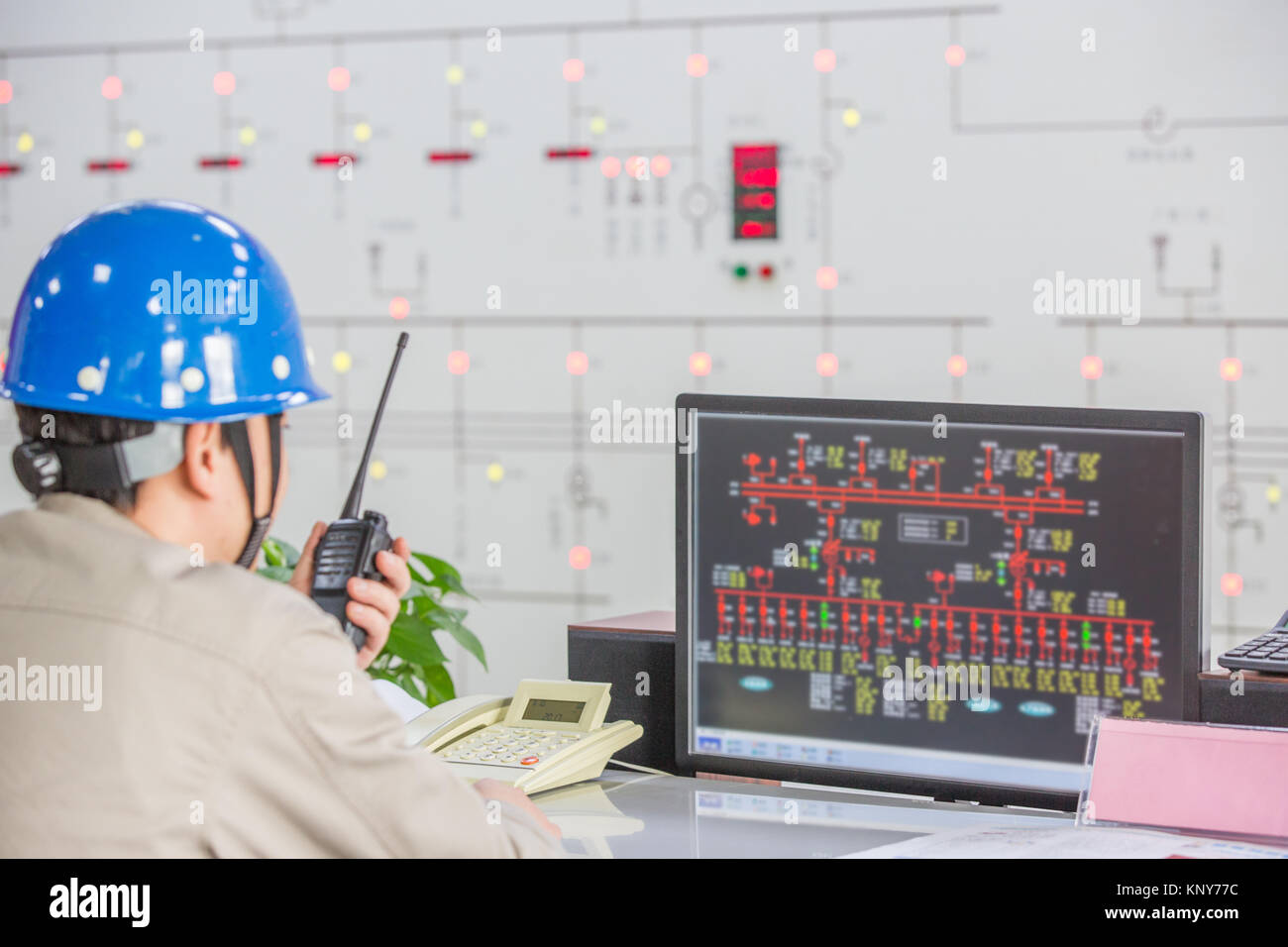 workers in control room of a factory Stock Photo - Alamy
