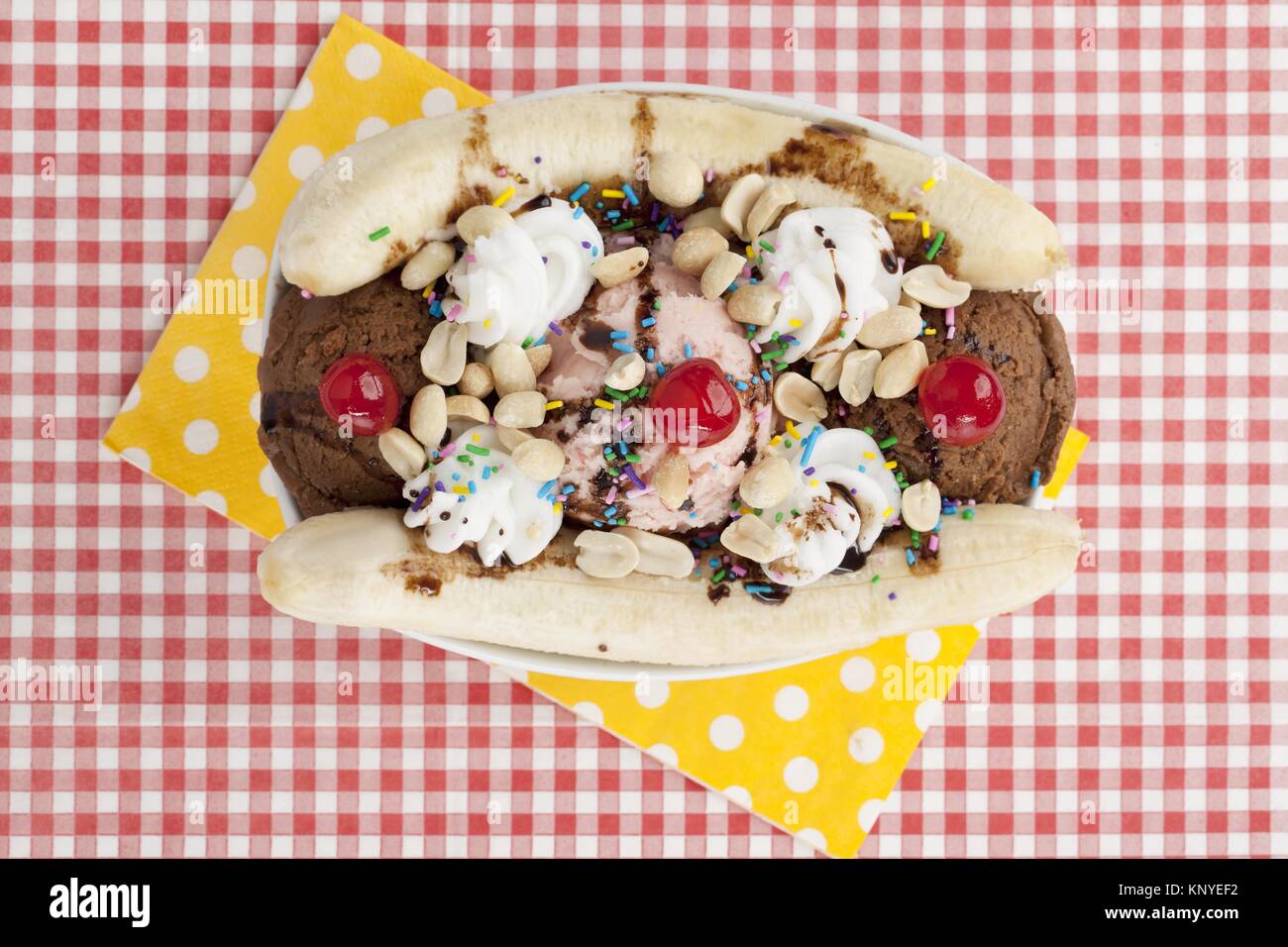 banana boat ice cream with yellow napkin Stock Photo Alamy