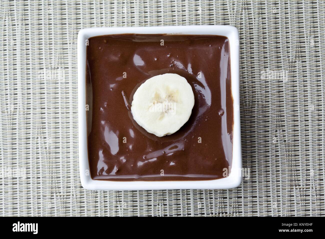 banana slice in chocolate syrup Stock Photo