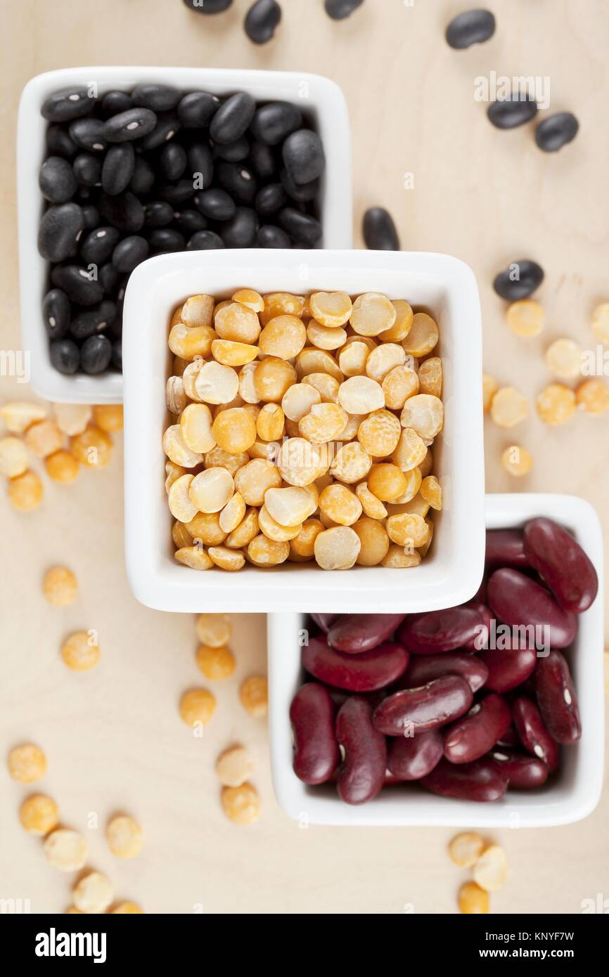 black beans yellow split peas and red beans Stock Photo Alamy