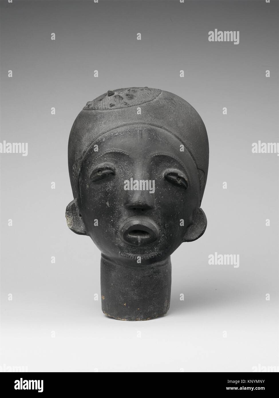 Memorial Head (Ntiri). Date: 17th century (?); Geography: Ghana, Adanse traditional area, Fomena (?); Culture: Akan peoples; Medium: Terracotta; Stock Photo