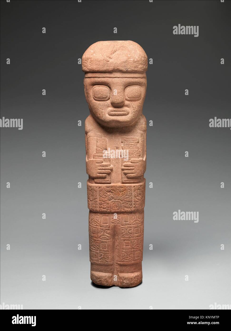 Figure with Ceremonial Objects. Date: 5th-9th century; Geography: Bolivia; Culture: Tiwanaku; Medium: Stone; Dimensions: H. 18 3/8 x W. 4 7/8 x D. 5 Stock Photo