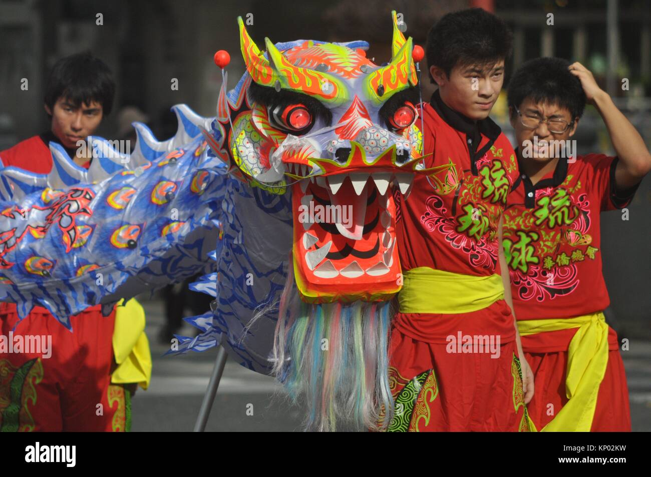 Naha, Okinawa, Japan: Dragon parade during the 6th Worldwide Uchinanchu Festival, celebrating the Okinawan emigrants Stock Photo