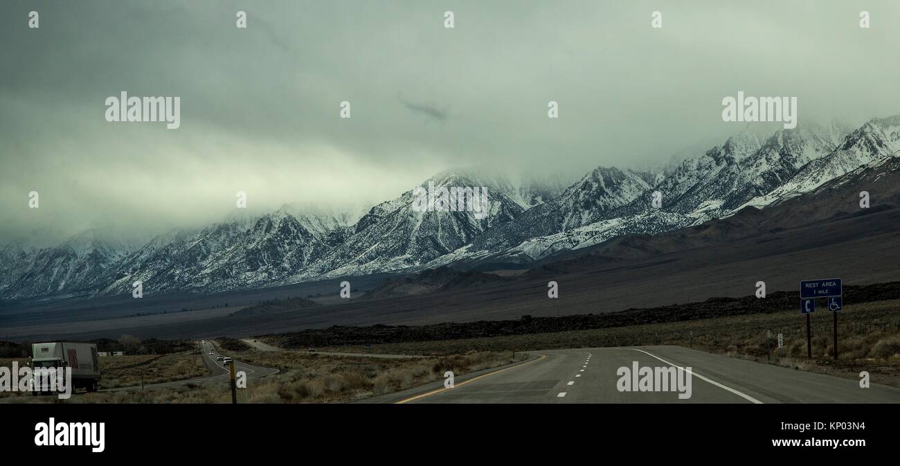 The snow-covered Sierra Nevada Mountains are the predominate feature at Owens Valley, California. Stock Photo