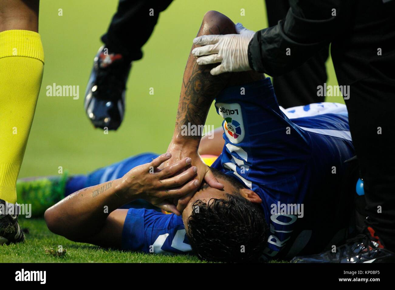 Second Division League Round 16 CD Lugo vs Tenerife, a player of Club Deportivo Tenerife, She complains on the ground after suffering a fault during Stock Photo