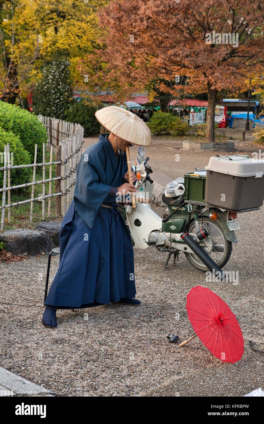 Fuke Zen performer playing a shakuhachi bamboo flute in Higashiyama