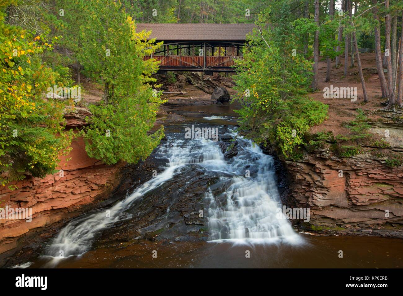 Lower Falls with Horton Covered Bridge, Amnicon Falls State Park, Wisconsin. Stock Photo