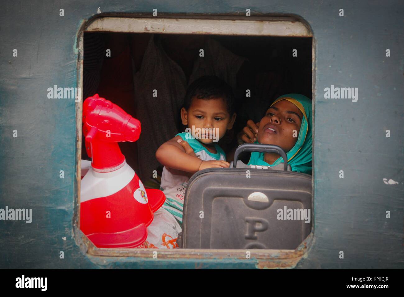 Bangladeshis cram onto a train as they travel home to be with their families ahead of the Muslim festival of Eid al Fitr, in Dhaka. EId-ul-fitr or Stock Photo