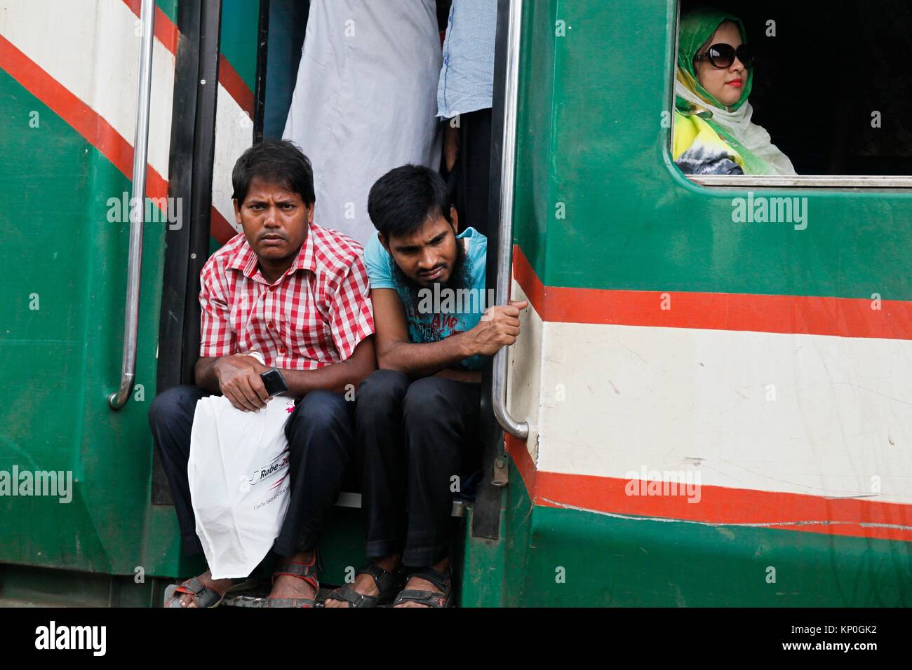 Bangladeshis cram onto a train as they travel home to be with their families ahead of the Muslim festival of Eid al Fitr, in Dhaka. EId-ul-fitr or Stock Photo