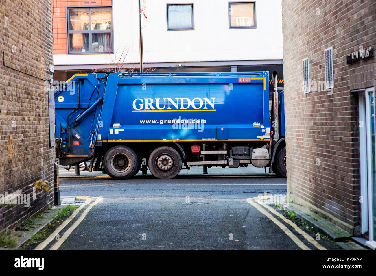 Waste Rubbish Collection Truck or Bin Lorry Parked on the Side of a Road Stock Photo