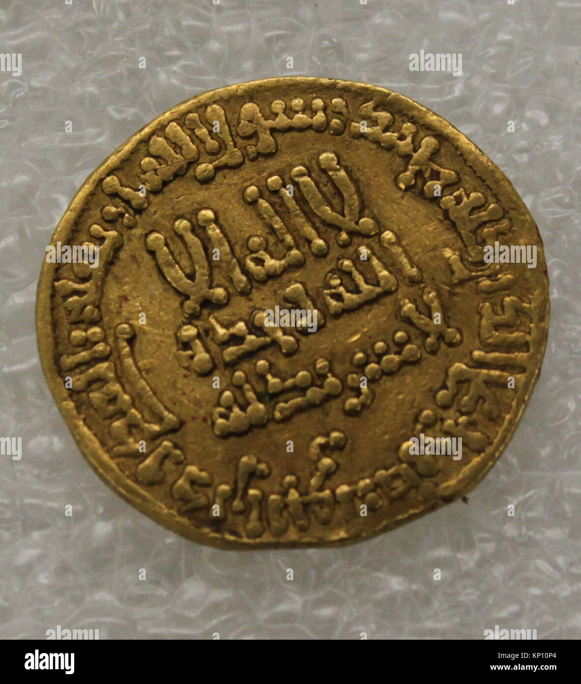 Coin With Inscription This coin, MET 10.130.1496a, is a historical example of currency ...
