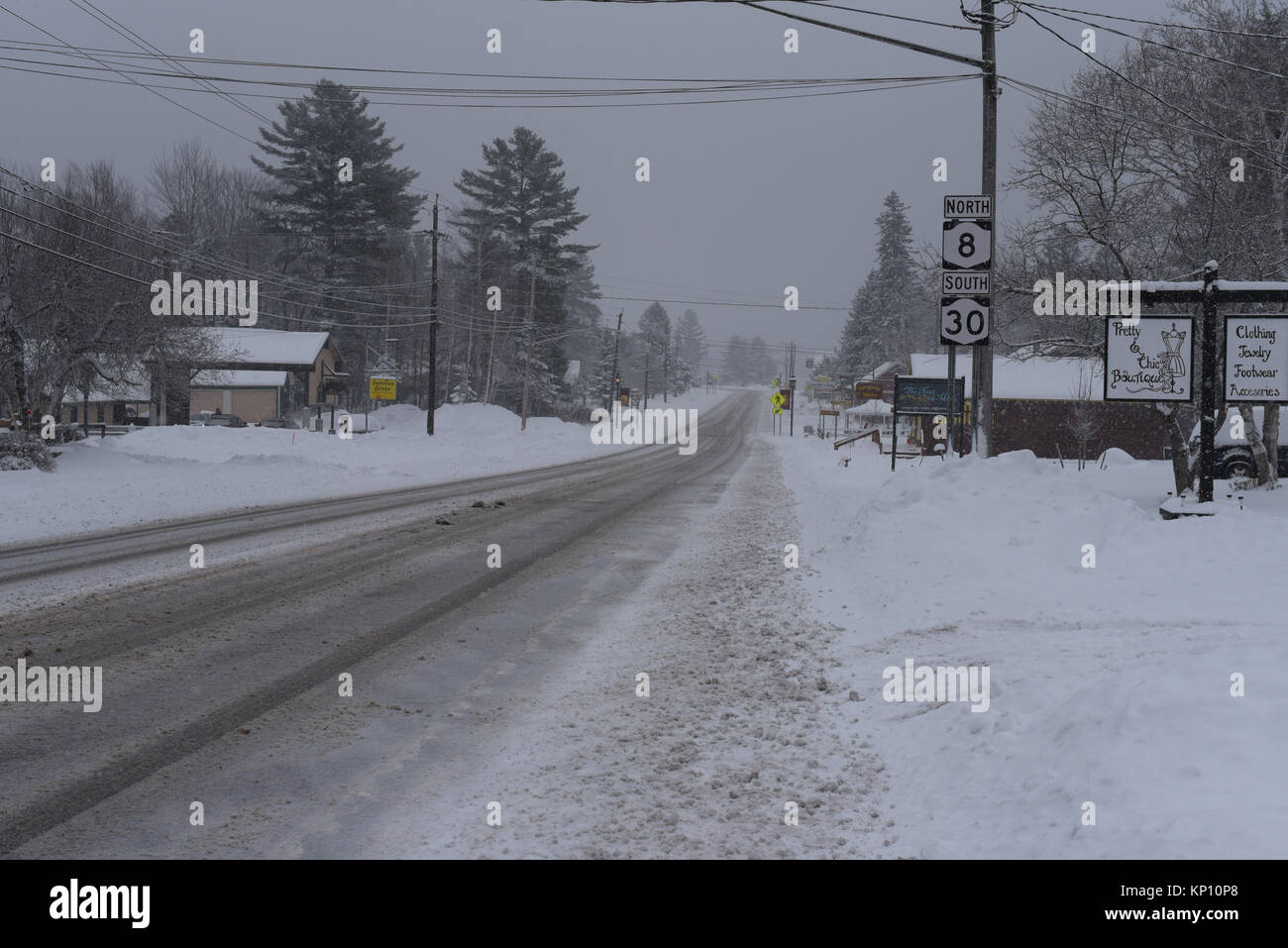Slippery snow covered road in Speculator, NY New York, USA in the