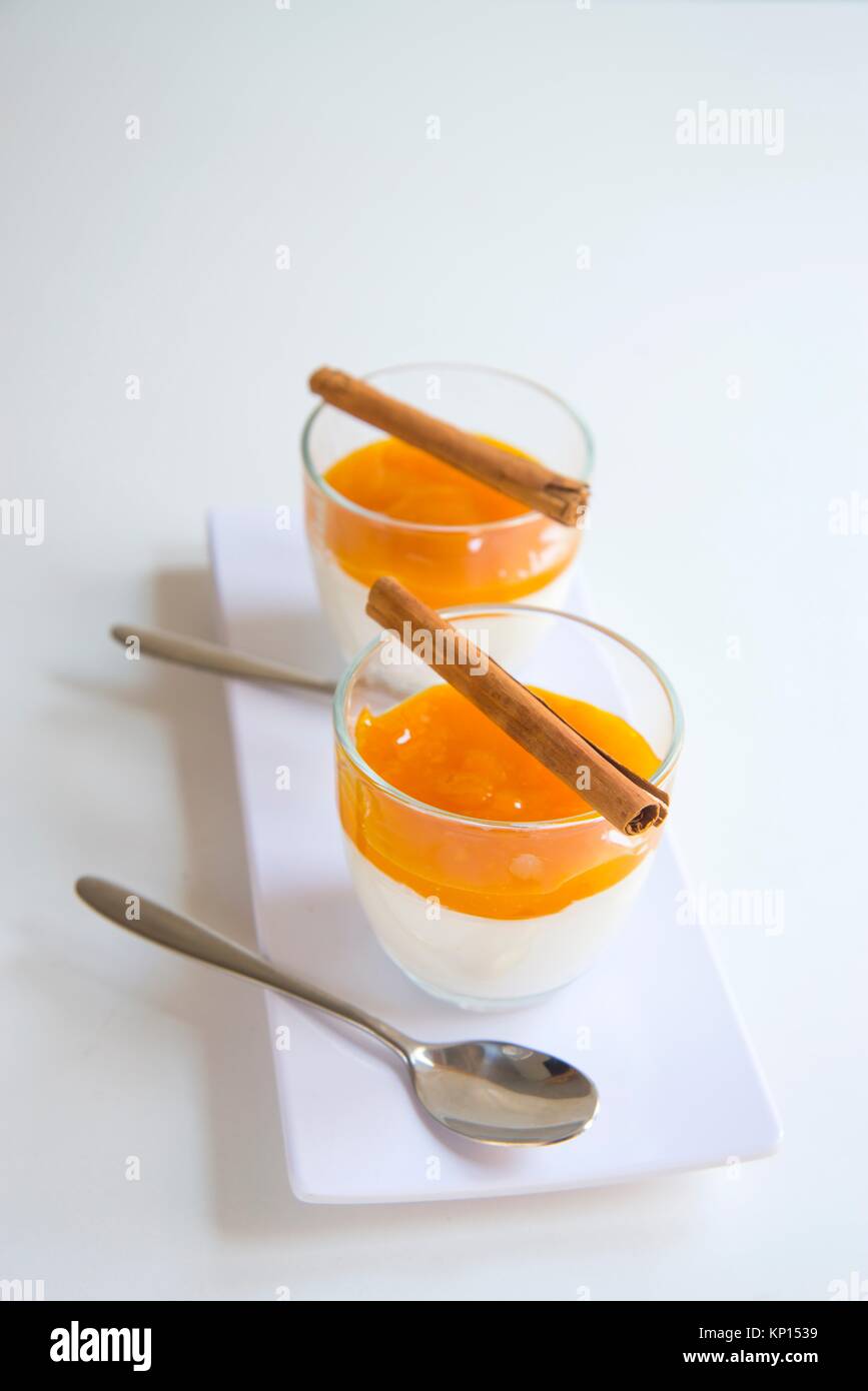 Two bowls of yoghurt with mango jam Stock Photo Alamy
