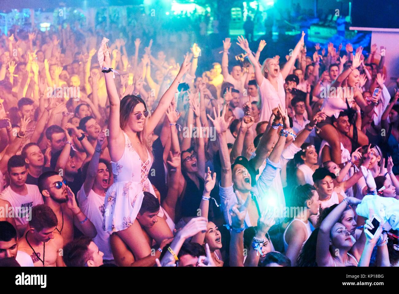party crowd cheering to Hardwell B2B Afrojack, enjoying edm dance music
