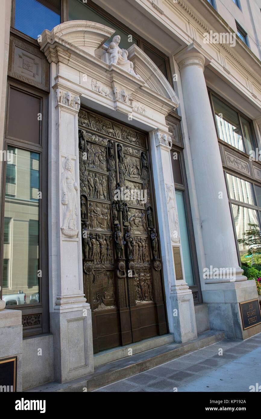 bronze and marble door bas relief carvings evocating tea production Boston MA USA Massachussets. Stock Photo