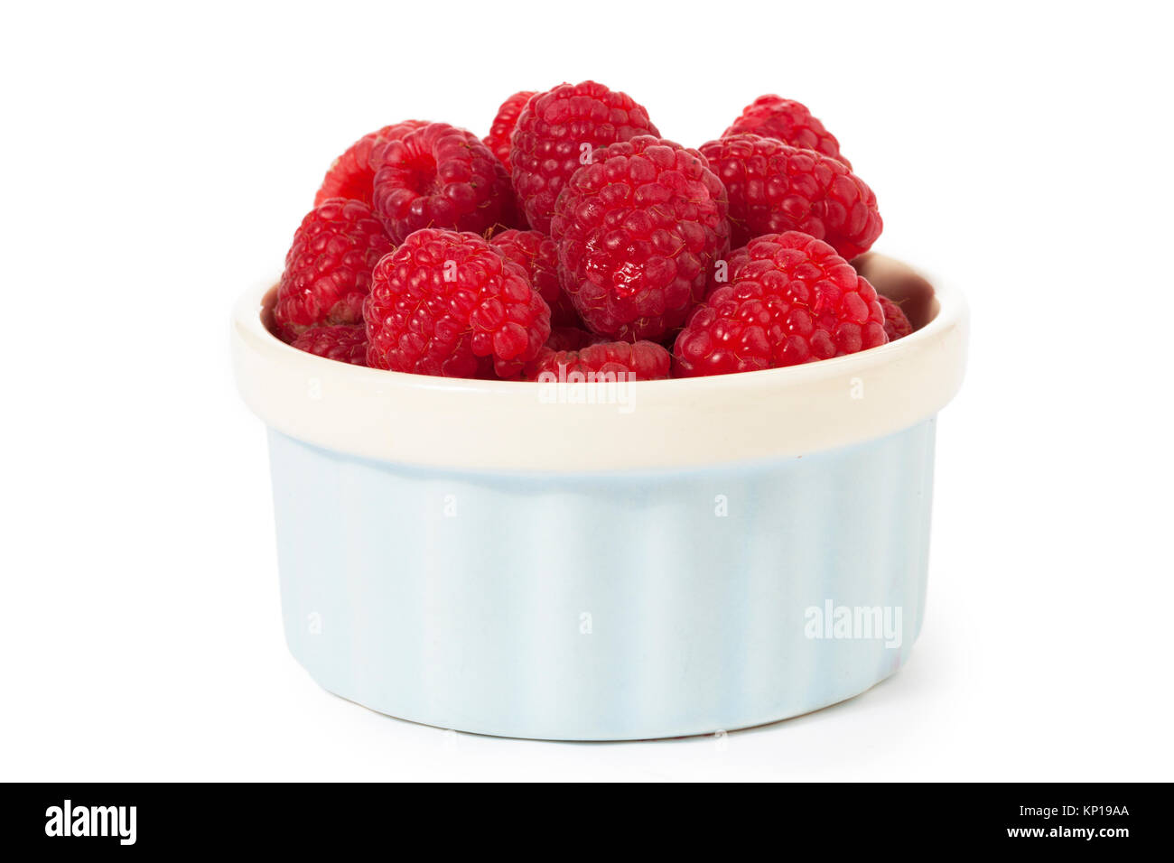 raspberries in a container Stock Photo Alamy