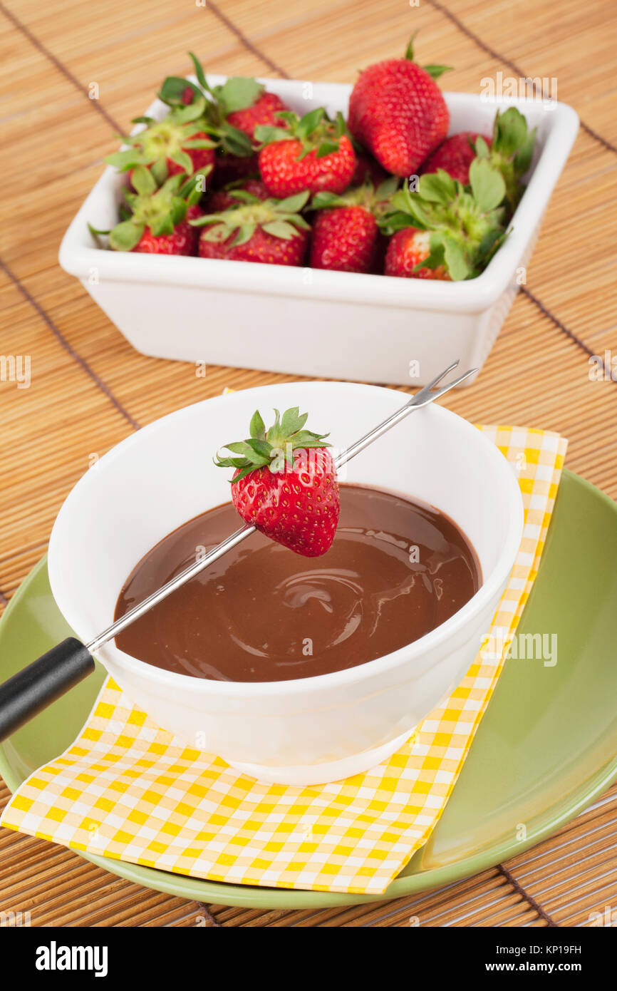 strawberries and chocolate syrup Stock Photo Alamy