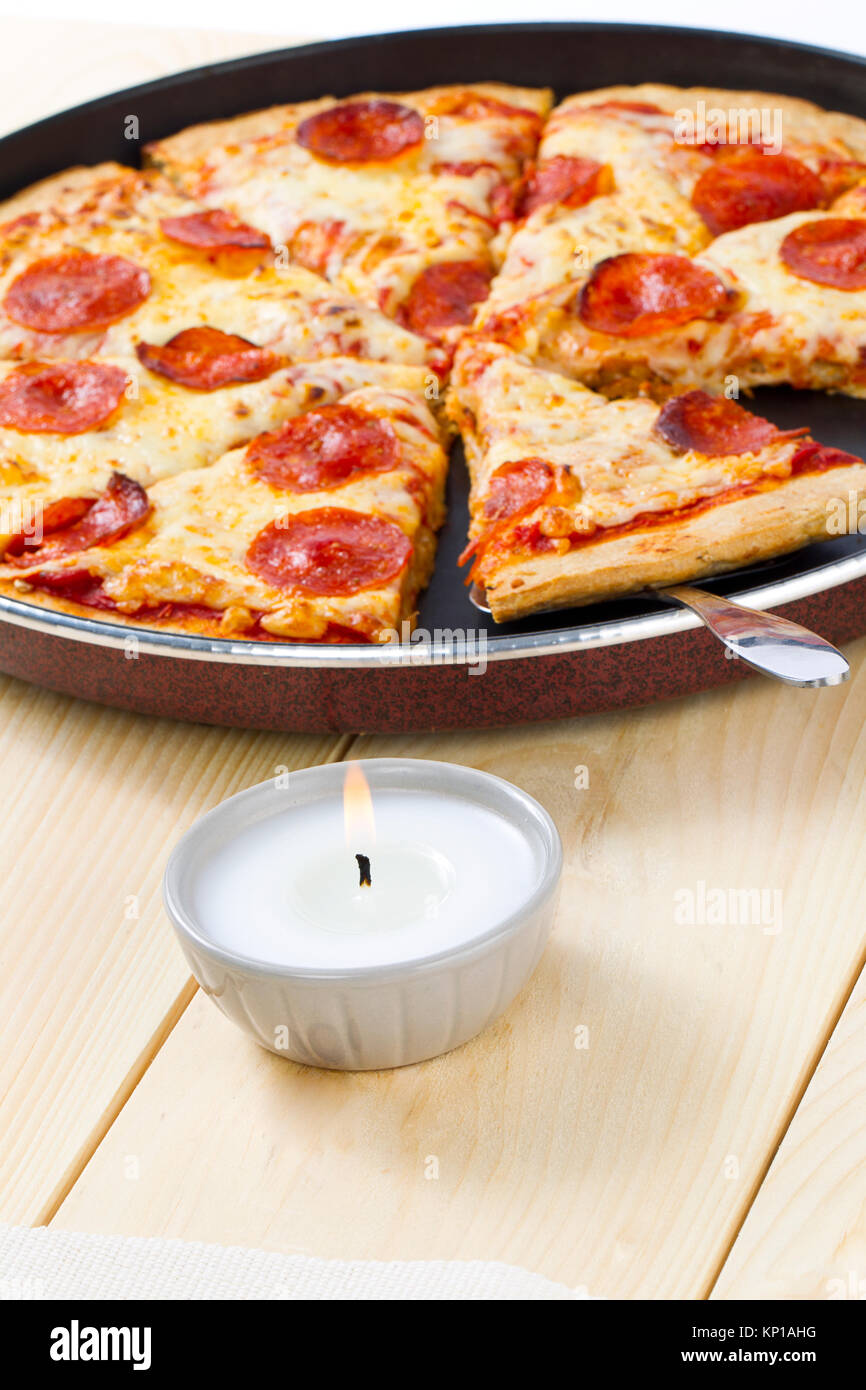 pizza on pan with spatula Stock Photo