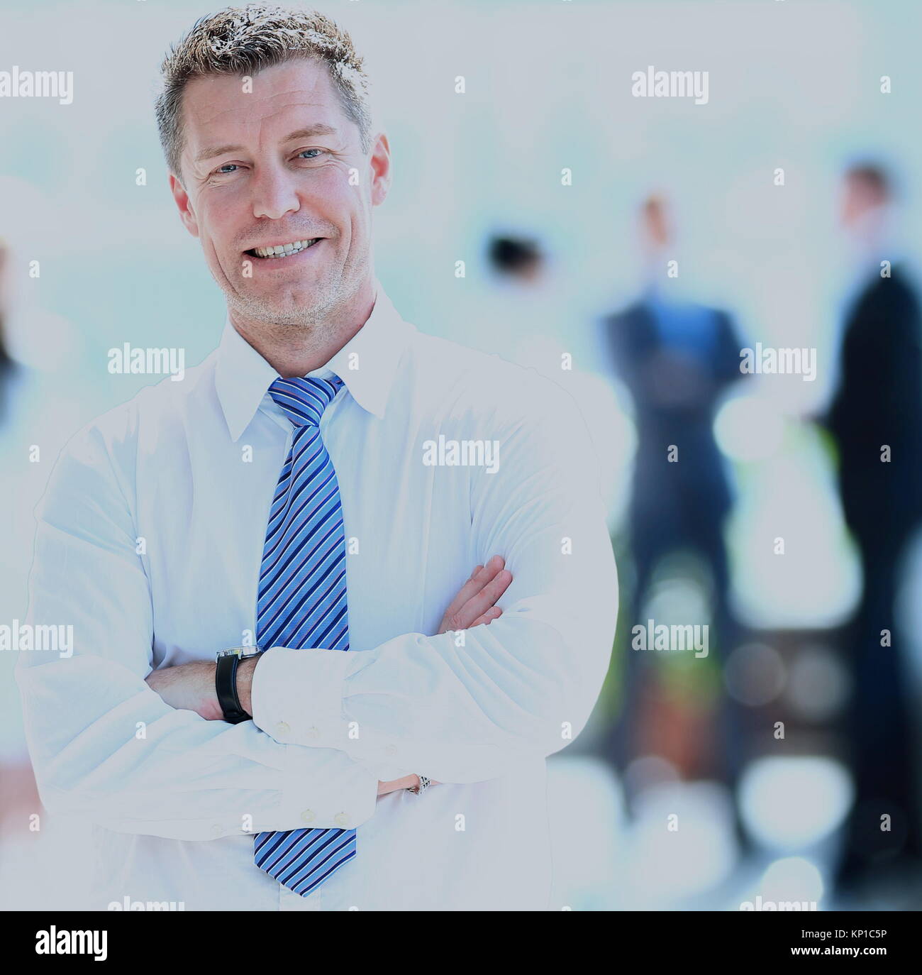 Portrait of happy smiling businessman in a modern office Stock Photo ...