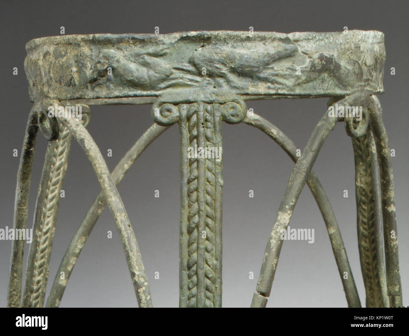 This ancient bronze rod tripod served as a functional support ...