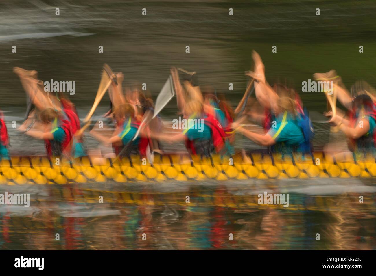 Dragon boat blur on Willamette River, World Beat Festival, Riverfront Park, Salem, Oregon. Stock Photo