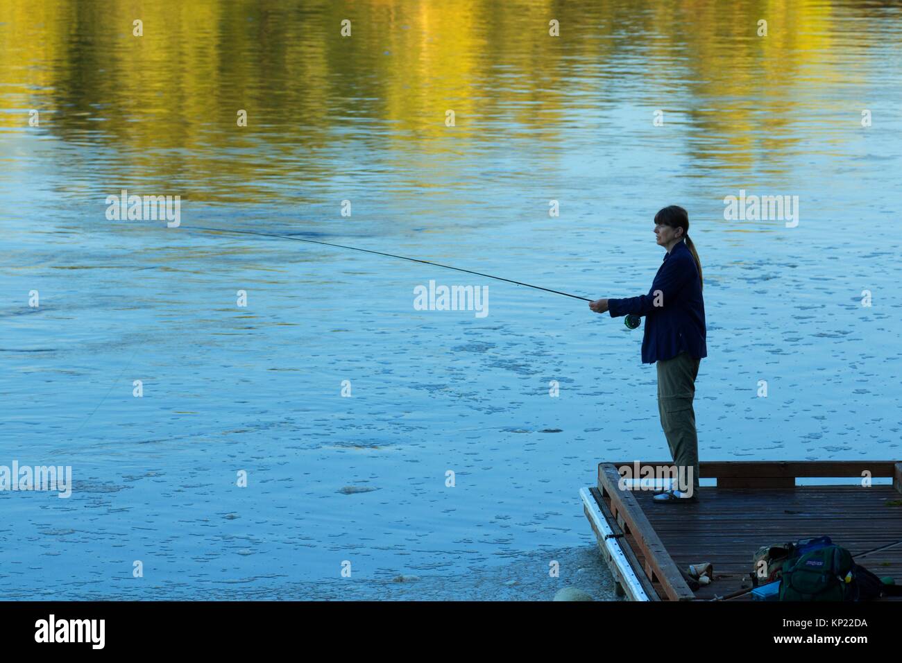 Flyfishing from boat dock on Willamette River, Willamette Mission State Park, Oregon. Stock Photo