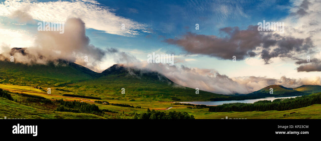 Panoramic early morning view of a summer sunrise at the Bridge of Orchy near Glen Coe, Scottish Highlands Stock Photo